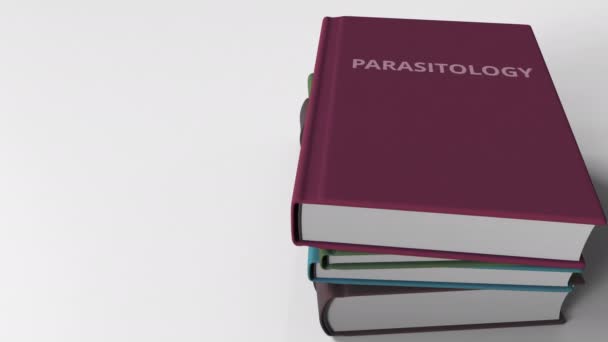 Titel der Parasitologie auf dem Buch, konzeptionelle 3D-Animation — Stockvideo