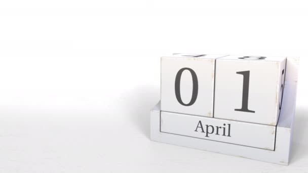 1 Απριλίου ημερομηνία στο ημερολόγιο ξύλινα μπλοκ. 3D animation — Αρχείο Βίντεο