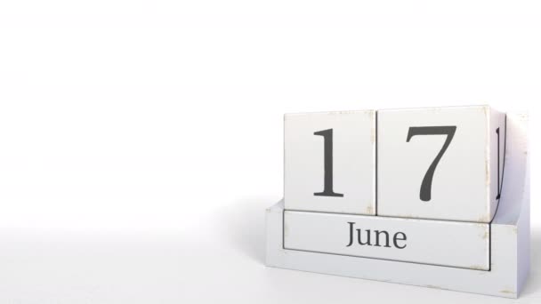 Bloques de madera calendario muestra 17 de junio fecha, animación 3D — Vídeos de Stock