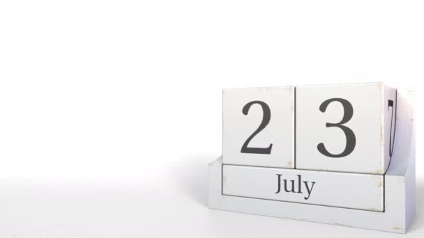 Kubus kalender toont 23 juli datum. 3D animatie — Stockvideo