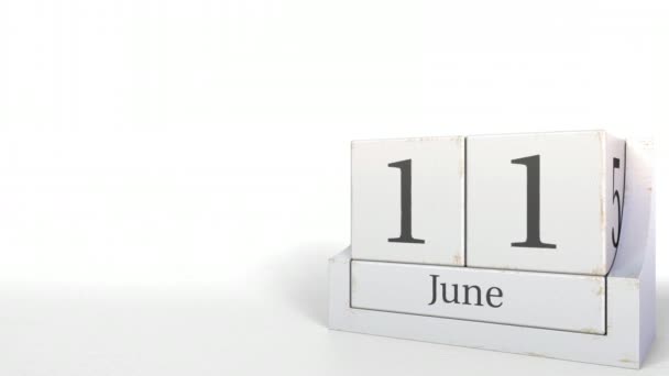 11 de junio fecha en el calendario de ladrillos de madera. Animación 3D — Vídeo de stock