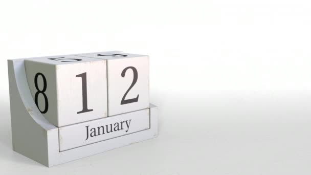 Wood cube calendar shows January 12 date, 3D animation — Stock Video