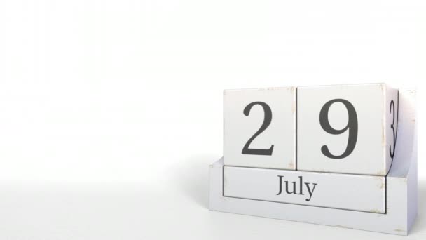 Calendário cubo de madeira mostra 29 de julho data, animação 3D — Vídeo de Stock