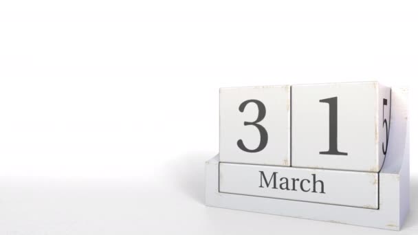 Houten blokken kalender bevat 31 maart datum, 3d animatie — Stockvideo