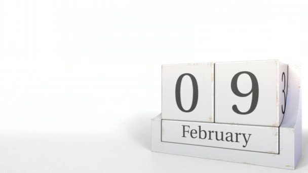 Календар дерев'яних блоків показує 9 лютого дату, 3D анімацію — стокове відео