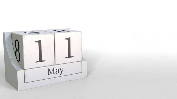 Cube calendar shows May 11 date. 3D rendering — Stock Photo, Image