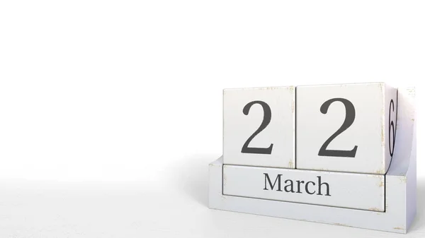 Calendário cubo mostra 22 de março data. Renderização 3D — Fotografia de Stock