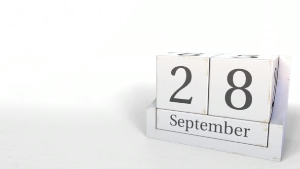 Cube calendar shows September 28 date. 3D animation — Stock Video
