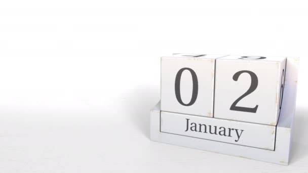 木製のブロック カレンダーは、1 月 2 日、3 d アニメーションを示しています。 — ストック動画
