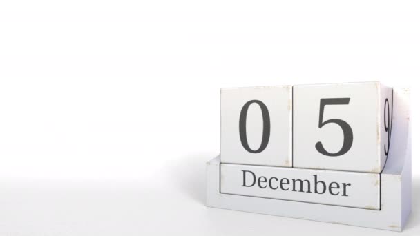 Κύβος ημερολόγιο δείχνει 5 Δεκεμβρίου ημερομηνία. 3D animation — Αρχείο Βίντεο