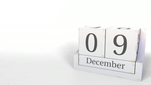 Cube calendar shows December 9 date. 3D animation — Stock Video