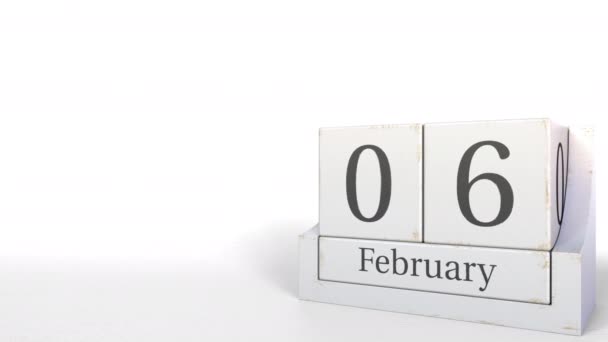 Wooden blocks calendar shows February 6 date, 3D animation — Stock Video