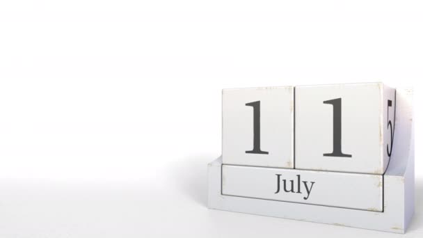 Календар кубиків показує 11 липня. 3D анімація — стокове відео