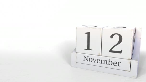 Houten blokken kalender bevat 12 November datum, 3d animatie — Stockvideo