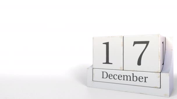Calendário cubo mostra 17 de dezembro data. Animação 3D — Vídeo de Stock