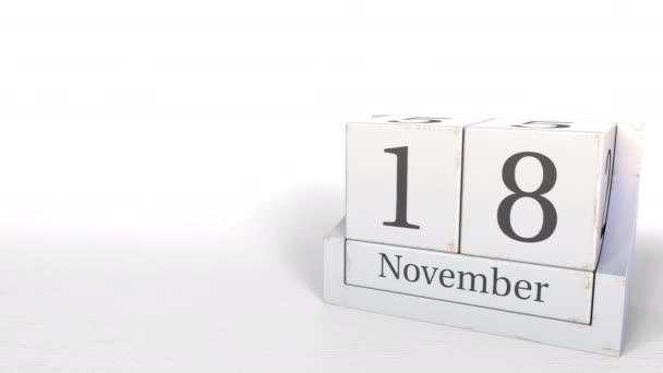 18 de noviembre fecha en el calendario de bloques de madera. Animación 3D — Vídeos de Stock