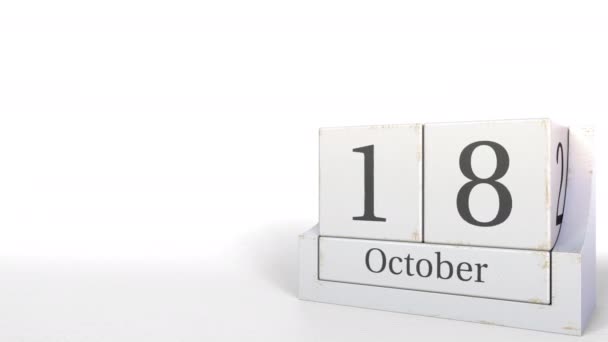 Houten kubus kalender bevat 18 oktober datum, 3d animatie — Stockvideo