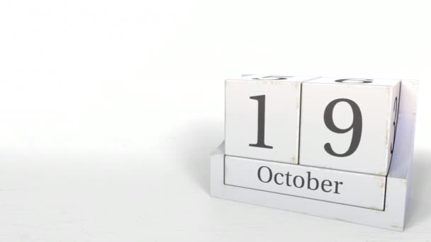 Cube calendar shows October 19 date. 3D animation — Stock Video