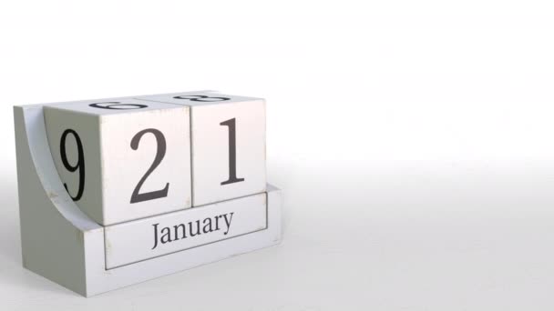 Kubus kalender bevat 21 januari datum. 3D animatie — Stockvideo
