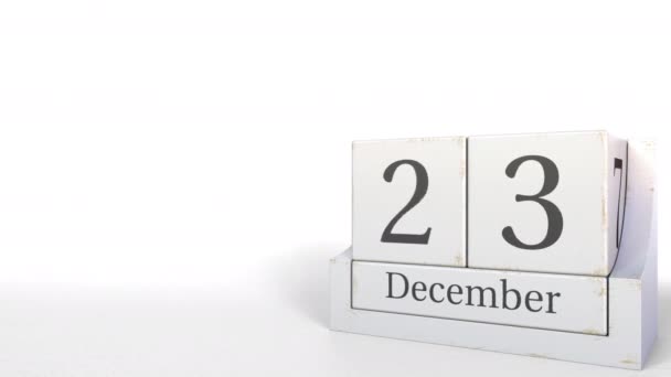 Wood cube calendar shows December 23 date, 3D animation — Stock Video