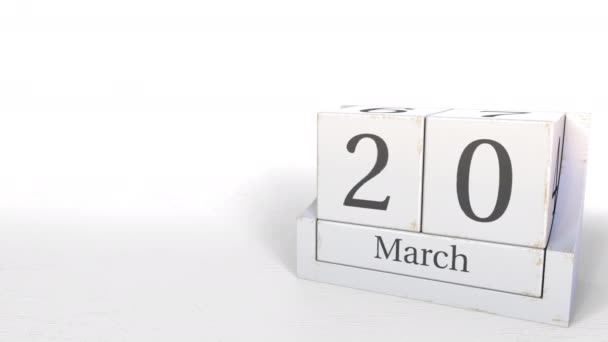 Kub kalendern visar 20 mars datum. 3D-animering — Stockvideo