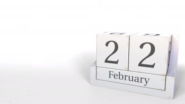 Kub kalendern visar 22 februari datum. 3D-animering — Stockvideo