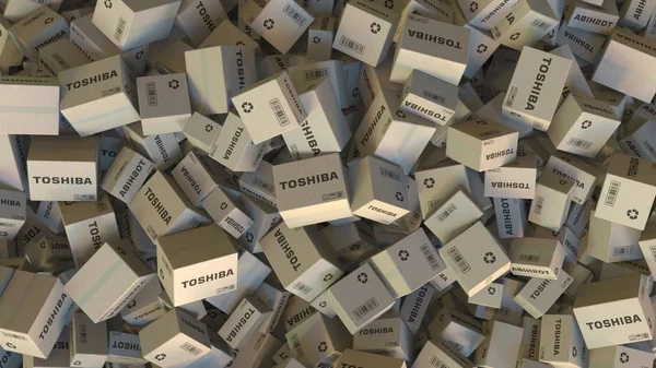 Pile de cartons avec logo TOSHIBA. Editorial rendu 3D — Photo