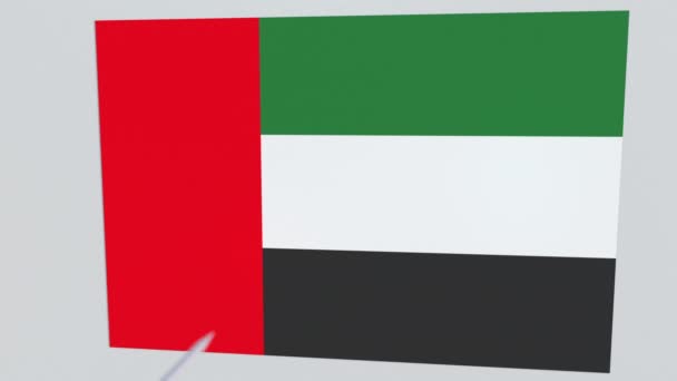 Bandera de la placa de los Emiratos Árabes Unidos golpeada por flecha de tiro con arco. Animación 3D conceptual — Vídeos de Stock