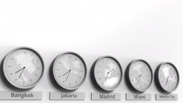 Clock shows Jakarta, Indonesia time among different timezones. Conceptual  3D animation — Stock Video © alexeynovikov #230680758