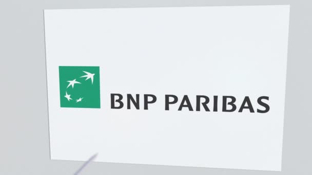 BNP PARIBAS company logo being hit by archery arrow. Business crisis conceptual editorial animation — Stock Video