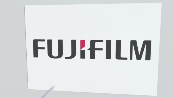 Fujifilm företagslogotyp drabbas av bågskytte arrow. Business kris konceptuella redaktionella animation — Stockvideo