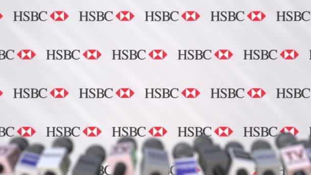Mediehändelse av Hsbc, tryck på väggen med logotyp och mikrofoner, redaktionella animation — Stockvideo