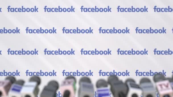 Conferencia de prensa de FACEBOOK, muro de prensa con logo como fondo y micrófonos, animación editorial — Vídeos de Stock