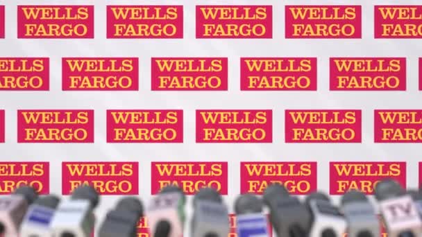 WELLS FARGO empresa conferencia de prensa, muro de prensa con logo y micrófonos, animación editorial conceptual — Vídeo de stock