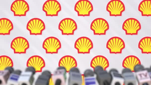 Conferenza stampa di SHELL, parete stampa con logo come sfondo e microfoni, animazione editoriale — Video Stock