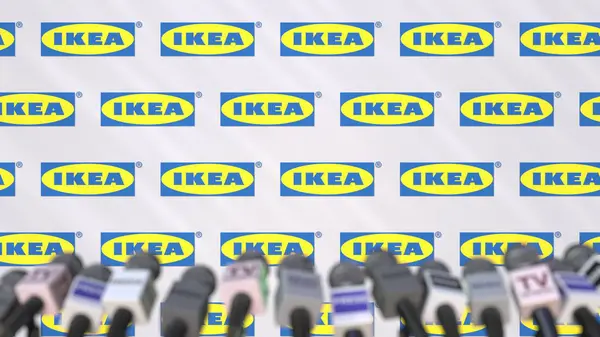 IKEA empresa conferencia de prensa, pared de prensa con el logotipo y micrófonos, conceptual editorial 3D renderizado — Foto de Stock