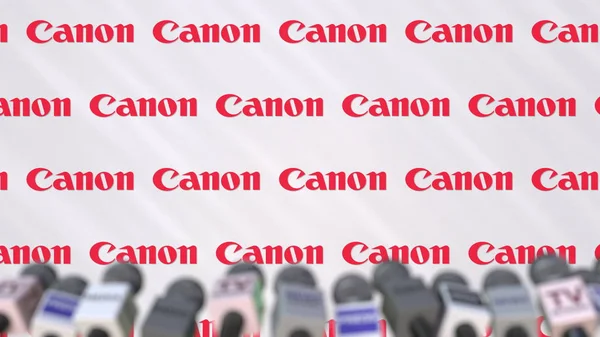 Canon 公司新闻发布会，新闻墙与徽标和麦克风，概念编辑 3D 渲染 — 图库照片