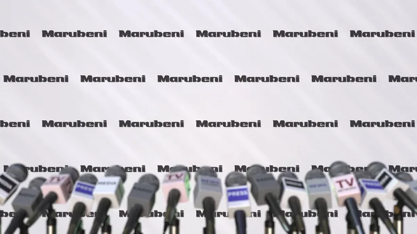 Marubeni bedrijf persconferentie, pers muur met logo en microfoons, conceptuele redactioneel 3D-rendering — Stockfoto