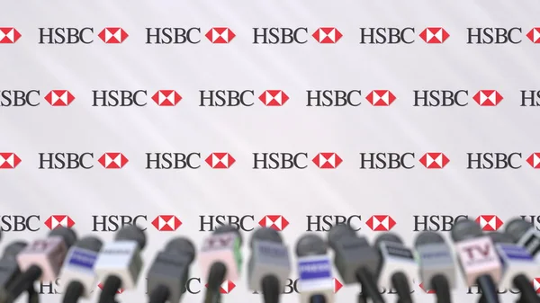 Evento mediático de HSBC, pared de prensa con logotipo y micrófonos, representación editorial 3D — Foto de Stock