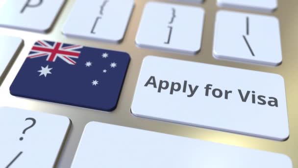 APPLY FOR VISA text and flag of Australia on the buttons on the computer keyboard. Conceptual 3D animation — Stock Video