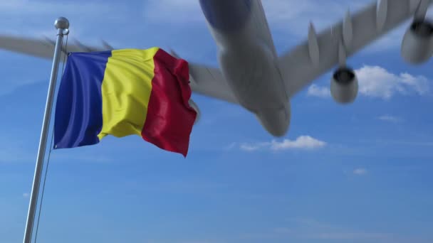 Commercial airplane landing behind waving Romanian flag. Travel to Romania conceptual animation — Stock Video