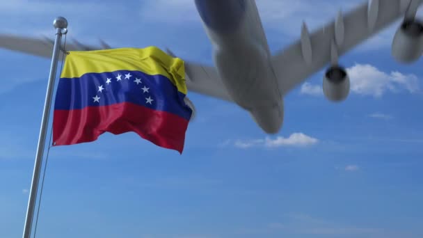 Kommersiella flygplan landar bakom viftar Venezuelas flagga. Resa till Venezuela konceptuella animation — Stockvideo