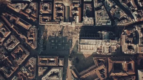 Aerial top-down shot of crowded square and the Cathedral or Duomo in the centre of Milan. Lombardy, Italy — Stock Video