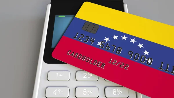 Payment terminal with credit card featuring flag of Venezuela. Venezuelan national banking system conceptual 3D rendering — Stock Photo, Image