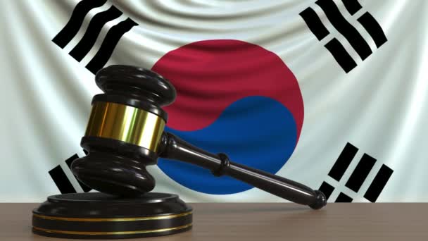 Juízes martelar e bloquear contra a bandeira da Coreia do Sul. Animação conceitual tribunal coreano — Vídeo de Stock