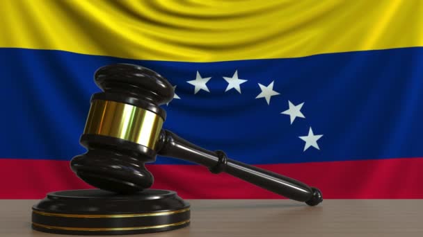 Judges gavel and block against the flag of Venezuela. Venezuelan court conceptual animation — Stock Video