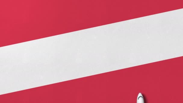 Komerční letadlo na vlajku Rakouska. Cestovní související koncepční 3d animace — Stock video