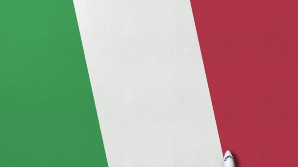 Commerciële vliegtuig op de vlag van Italië. Toerisme gerelateerde conceptuele 3d animatie — Stockvideo