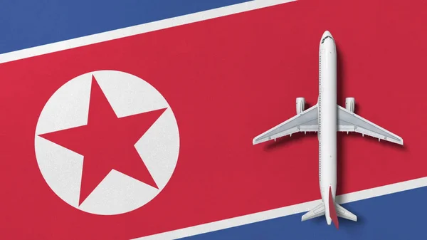 Avião comercial na bandeira da Coreia do Norte. Viagens relacionadas com renderização 3D conceitual — Fotografia de Stock