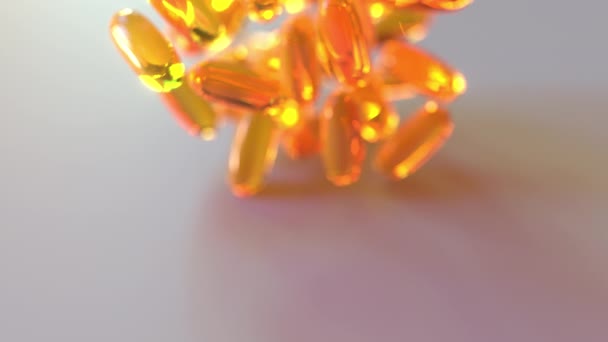 Despeje óleo de peixe ou cápsulas de drogas laranja na mesa. Animação 3D realista — Vídeo de Stock